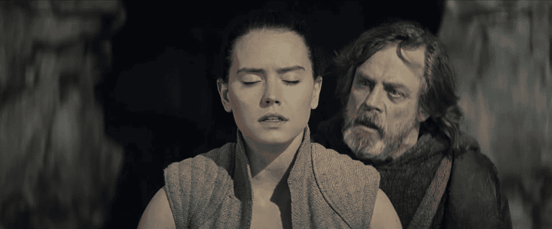 Rey (Daisy Ridley) tries to ignore the creepy old man (Mark Hamill) invading her personal space.